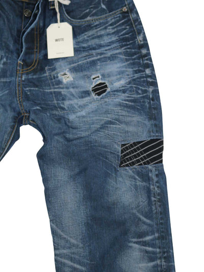 Herren Vintage Jeans dunkelblaue Waschung mit reparierten Löchern an linker Tasche und linken Bein Seitennaht