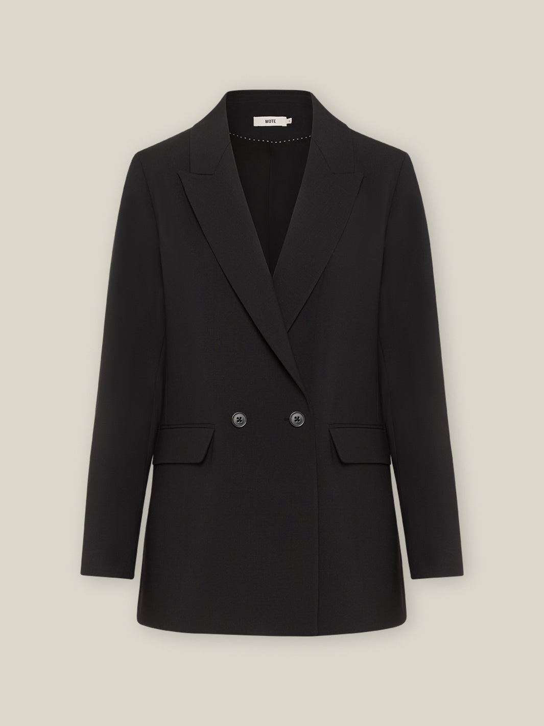 Schwarzer WOTE Blazer aus nachhaltiger Tuchwolle in klarer Frontansicht vor hellem Hintergrund.