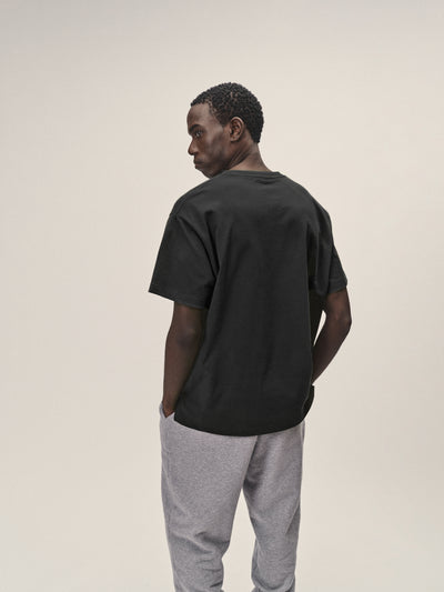 Herren T-Shirt, oversized Fit in Anthrazit aus Bio-Baumwolle von WOTE - made in Portugal, Rückenansicht